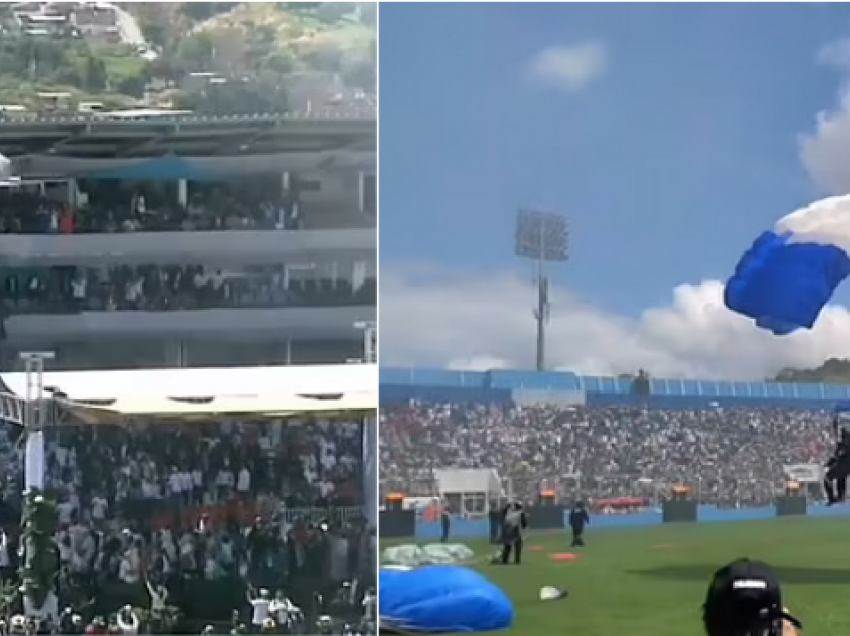 Forcat speciale të Honduras përplasen në stadium gjatë zbritjes ceremoniale me parashutë, një mbetet varur në çati